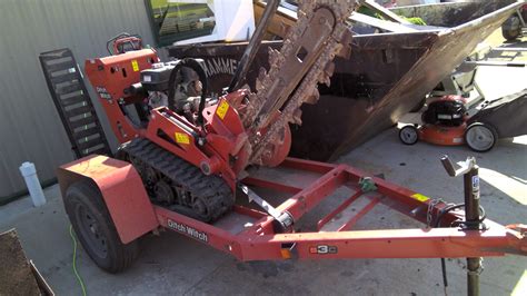 11 13 Hp 24″ To 30″ Trencher W Trailer Warroad Rentals
