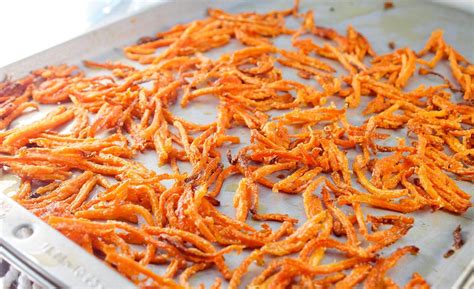 Carrot is a root vegetable that is rich in beta carotene, vitamin a and other minerals that makes it good for eyesight and skin. parmesan carrot shoestring fries | Shredded carrot recipe ...