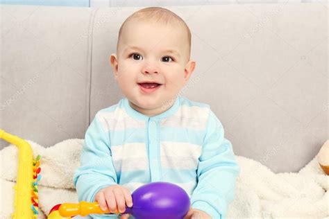 Adorable Baby With Toys — Stock Photo © Belchonock 95800960