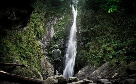 121 Man Standing Under Waterfall Stock Photos Free And Royalty Free