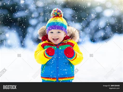 Child Playing Snow Image And Photo Free Trial Bigstock