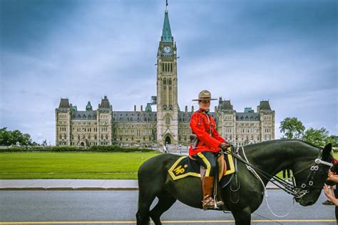 female canadian mounted police officer at parliament hill ottawa canada editorial photography
