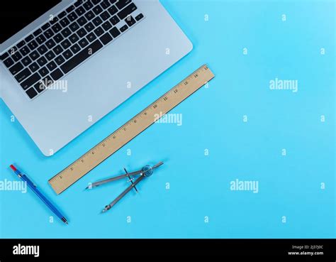 Blue Desktop With Architect Designer Tools Consisting Of Ruler