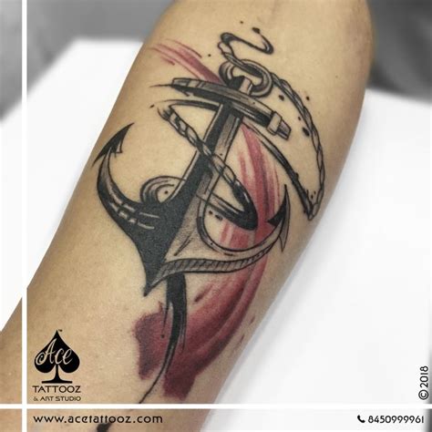 An Anchor Tattoo On The Left Arm
