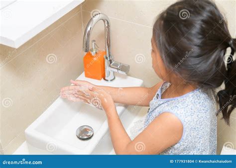 Washing Hands Child Rinsing Soap With Running Water At Sink Royalty