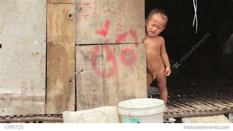 Naked Baby Crying In Shack Stock Video Footage