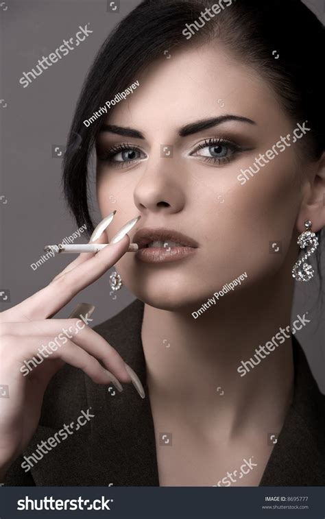 Charming Girl Smokes Stock Photo 8695777 Shutterstock