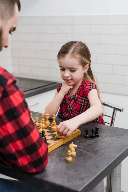 Premium Photo Father And Daughter Playing Chess On Fathers Day