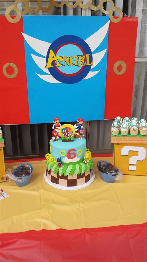 The blue hedgehog with the ultrasonic power delights the youngest and the. Sonic and Mario cake | Mario birthday, Mario party, Kids party