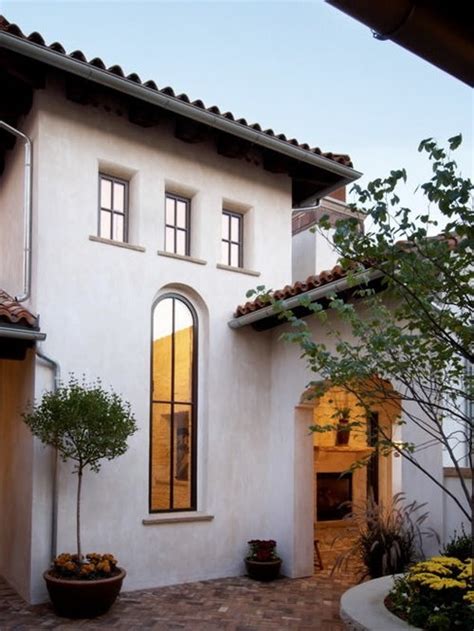 Stucco or render is a construction material made of aggregates, a binder, and water. Exterior Plaster Home Design Ideas, Pictures, Remodel and ...