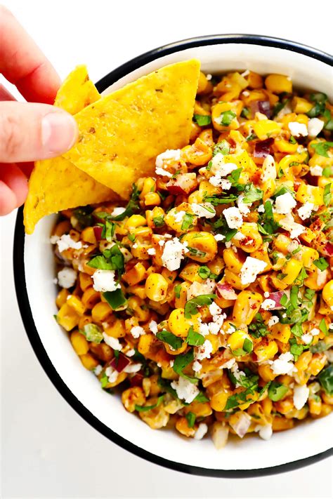Elote, aka mexican street corn, is charred & juicy corn on the cob smothered in a cheesy chile, lime, and cilantro sauce. Easy Elote Dip | Gimme Some Oven