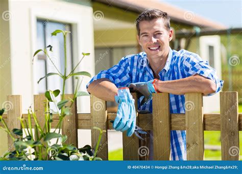 Man Leaning Fence Relaxing Stock Photo Image Of Portrait 40470434