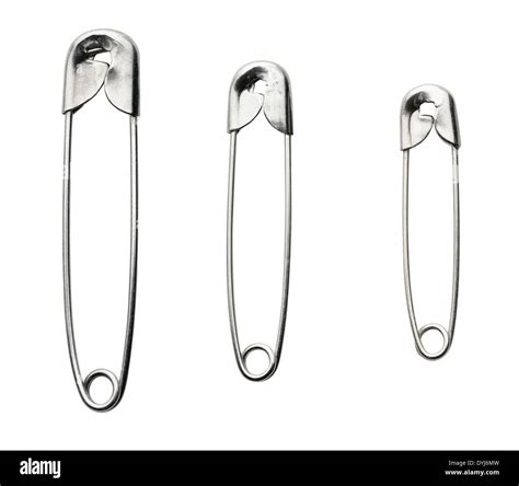 Three Closed Safety Pins Isolated On White Background Stock Photo Alamy