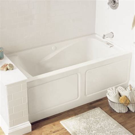 Deep japanese tubs are the ultimate in soaking tubs. Lifestyle picture of the American Standard Evolution bathtub.