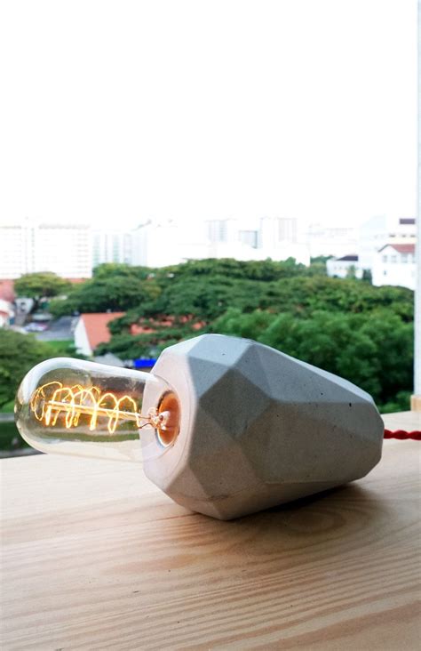 Now that we are pretty much finished with the renovation of our house, i finally get to focus on the fun things and little touches here and there. Geometric Bedside Lamp | Bedside lamp, Geometric, Concrete lamp