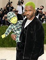 Frank Ocean arrives at the 2021 Met Gala with a green robot baby in a ...