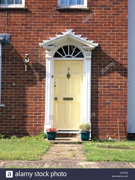 Pin By Marion Fisher On Front Door Red Brick House Yellow Doors