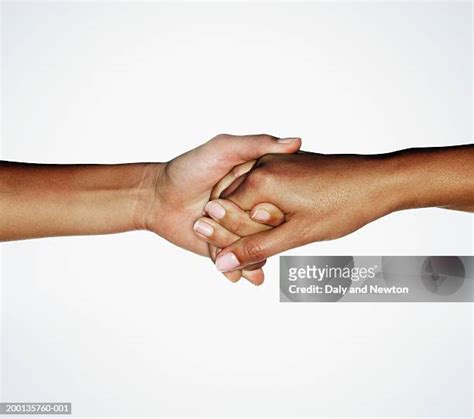 2 People Holding Hands Photos And Premium High Res Pictures Getty Images