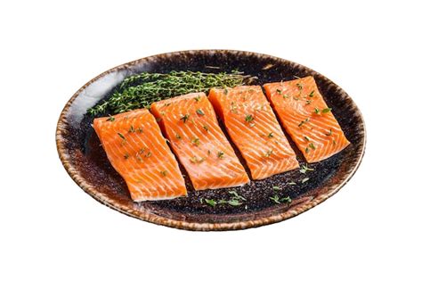 Premium Photo Salmon Fillet Steaks Raw Fish With Thyme And Herbs