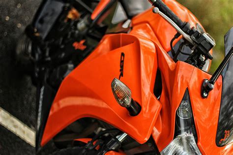 Find the perfect orange black motorcycle stock photo. Gloss Orange Honda CBR 150 | Wrapfolio