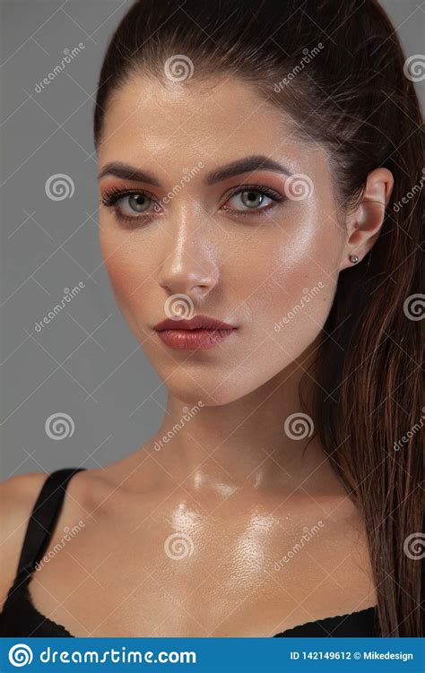 Closeup Portrait Of Beautiful Young Woman With Clean And Fresh Skin