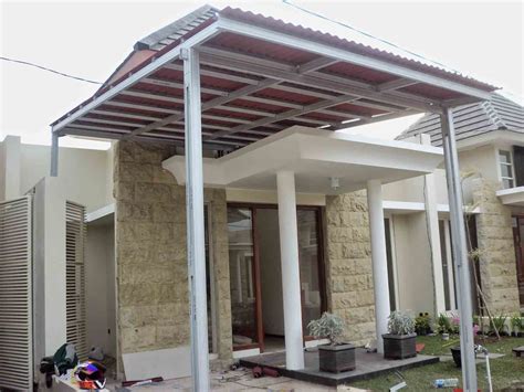 Kanopi ini terbuat dari bahan beton dengan desain yang cukup sederhana. 40 Gambar Model Kanopi Rumah Minimalis | Desainrumahnya.com