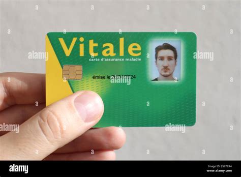 Young man's health insurance card of the national health care system in