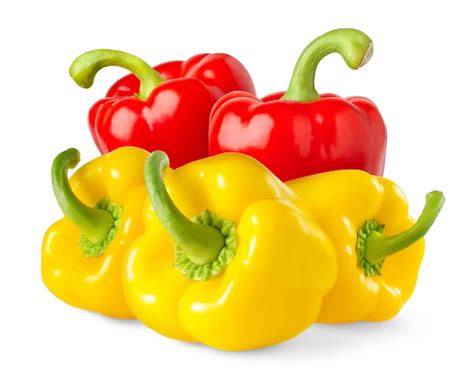 Premium Photo Red And Yellow Bell Peppers Isolated On White Surface