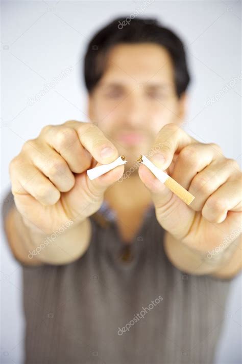 Man Breaking Cigarette Stop Smoking — Stock Photo © Fabianaponzi 12658939