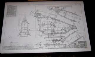 A Blueprint Drawing Of A Plane On Top Of A White Board In The Dark