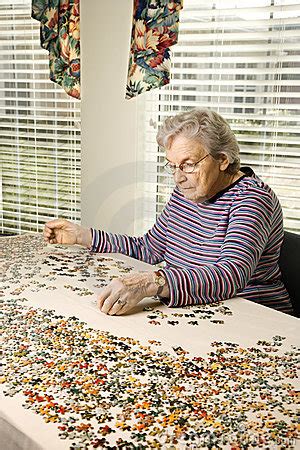 Create, play, share jigsaw puzzles and compete with other users. Jigsaw puzzles for seniors - elderly woman solving a ...
