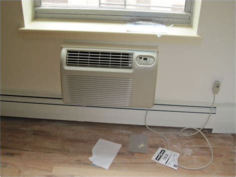 Air conditioners installed into a wall function the same as window air conditioners: Poorly Mounted Air-Conditioners Drain Energy Savings in ...