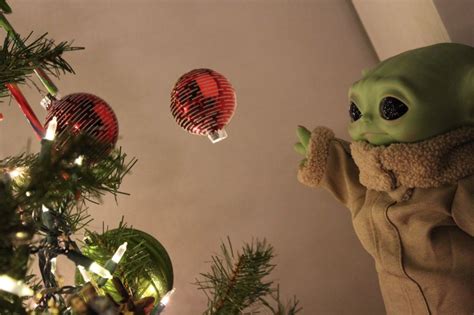 Baby Yoda Smiling See Why Its The Cutest Christmas Tree Topper Ever
