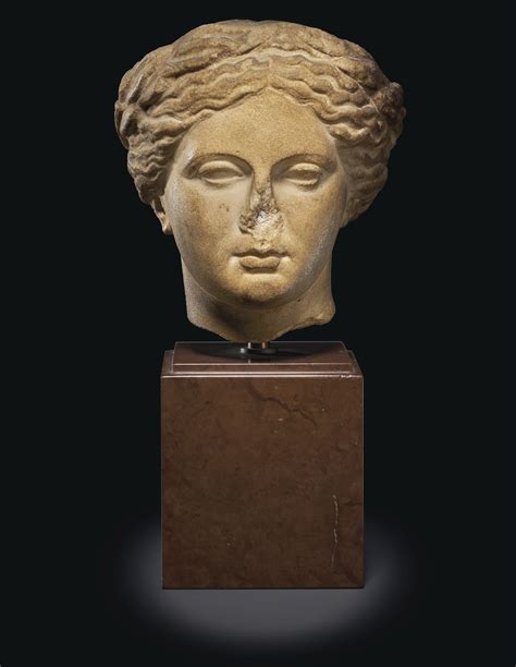 A Greek Marble Head Of Apollo Hellenistic Period Circa 2nd 1st