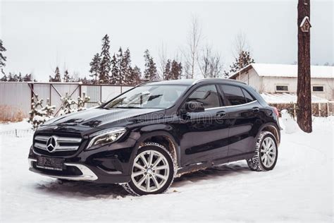 Mercedes Benz Gla 250 On A Snow Covered Street Outside The City