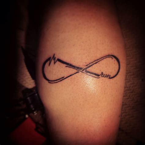 Running Tattoo With Infinity Symbol Running Tattoo Tattoos Infinity Tattoo