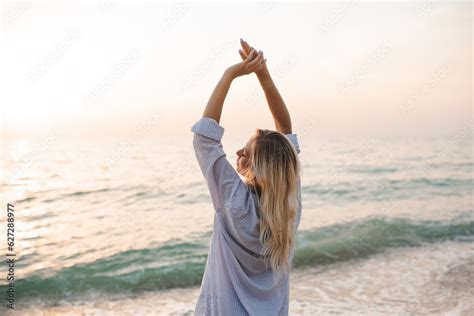 Attractive Sensual Woman Wearing Wet Shirt At Beach Over Sea Waves