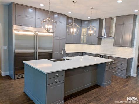 Bodbyn door has a frame and a beveled panel that give it a distinct, traditional character. IKEA kitchen with Bobdyn gray doors in Orlando - NKBA