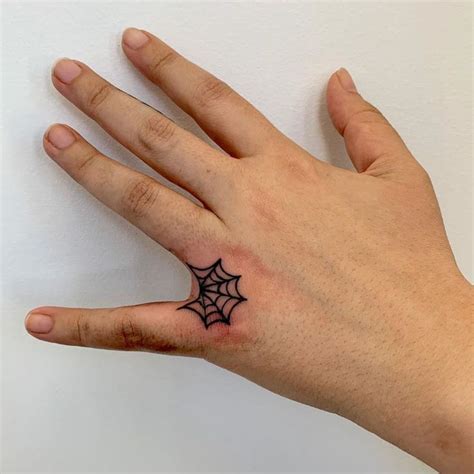 Rate This Small Spider Web Tattoo 1 To 100 Web Tattoo Finger Tattoos