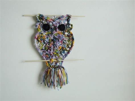 Use a rod to hang your tapestries that have pockets in the back. plus 3 crochet: owl wall hangings