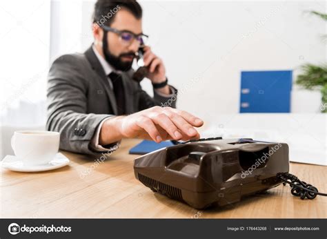 Businessman Dialing Number Stationary Telephone Office — Stock Photo