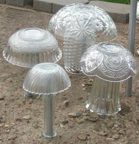 Spray paint the entire thing and using a paper towel and some paint thinner wipe away the paint off the surface of the glass after its dry. Recycled glass garden mushrooms - Glimmering Garden Gems