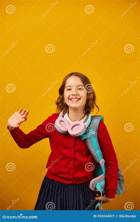 Stylish School Teenage Girl In Headphone With A Backpack Stock Image
