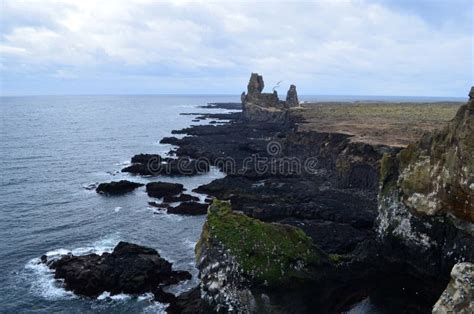 Londrangar Lava Rock Formation Along Coastal Iceland Stock Image