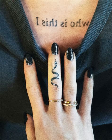 This Small Snake Tattoo Is Edgy And Cool And We Like That It Looks As