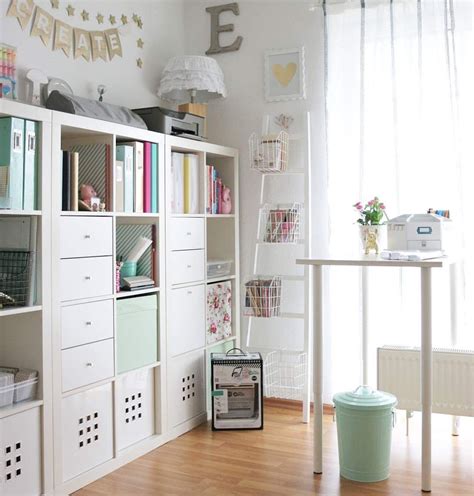 Do you dream of having colored pens organized like a rainbow, orderly spools of thread you can always find and paint supplies in cute containers? I love the bright white of this room and the amazing ...