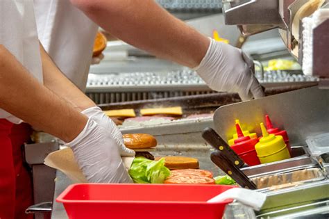 Search for fast food in these categories. Fast Food Workers Working In A Hamburger Restaurant Stock ...