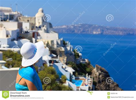 Tourist Looking At Santorini Greece Stock Photo Image Of Leisure