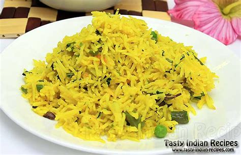 Step 1 put all the ingredients in a large pan with 1 tsp salt and 500ml water, then heat until boiling and the butter has melted. How to make Yellow Rice - Yellow Rice Recipe