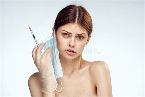 Woman Holding Syringes In Her Hand Injections Medical Mask Naked